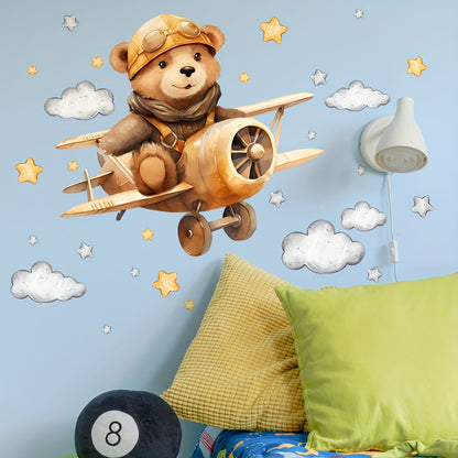 Väggdekor med söt nallebjörn i retro flygplan
